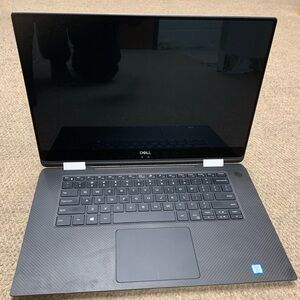 Dell XPS 15 9575 2-in-1 Laptop. RAM size - 8 gig, SSD capa - 256, FHD, touchscre